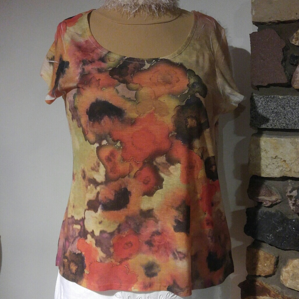 Watercolor look pullover top in oranges & browns.